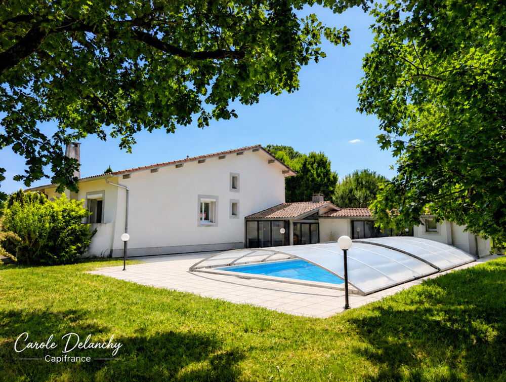 Maison d'architecte, 5 chambres, piscine, dépendances et parc arboré de plus de 3 600 m² à AIRE SUR L'ADOUR (40)
