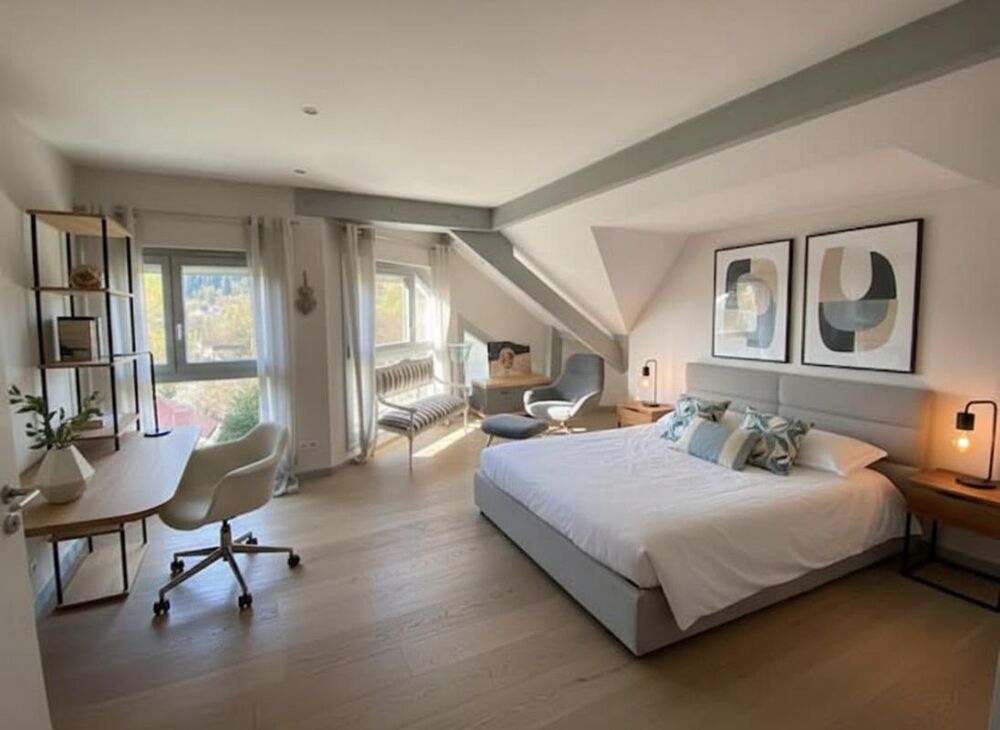 Vente Chalet Gérardmer - Chalet pièce de vie vue lac, 4 chambres, 2 garages  151 m²  DPE C Gerardmer