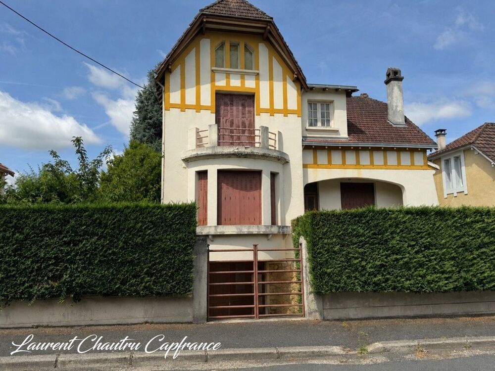 Maison de caractère avec jardin et garage