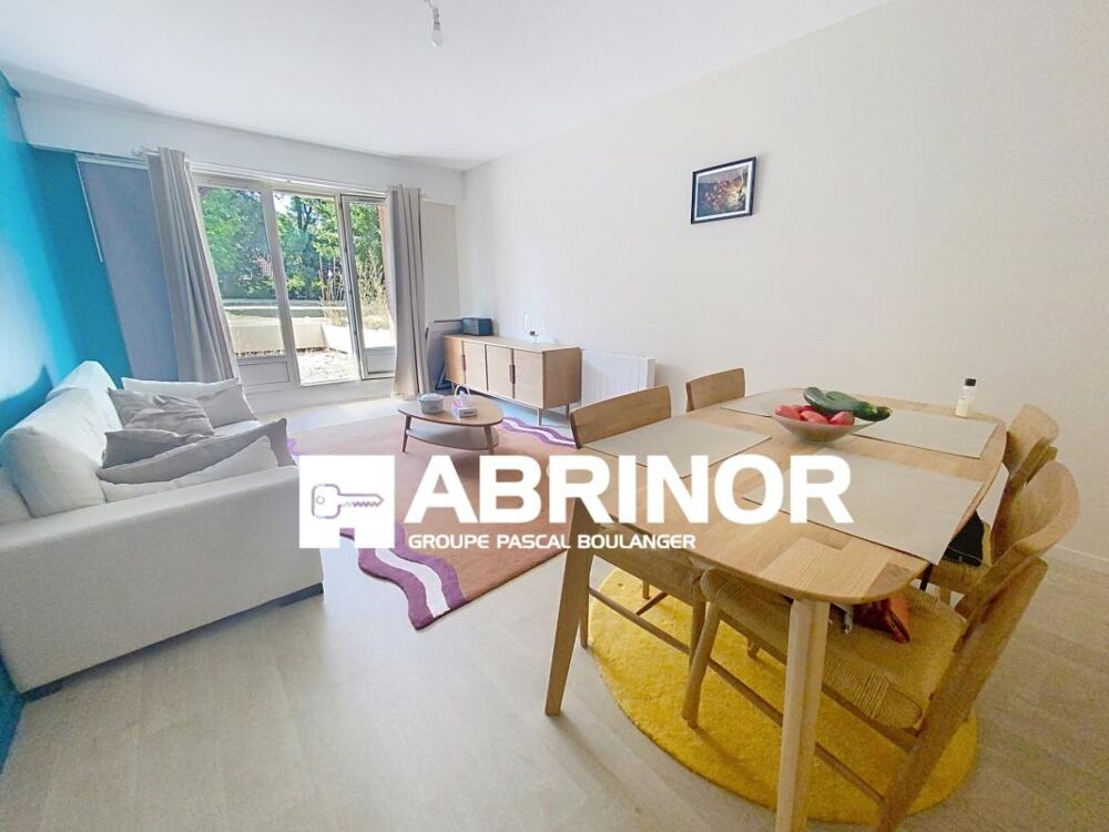 Appartement de type 2 en rez-de-jardin- terrasse- place de parking-cave
