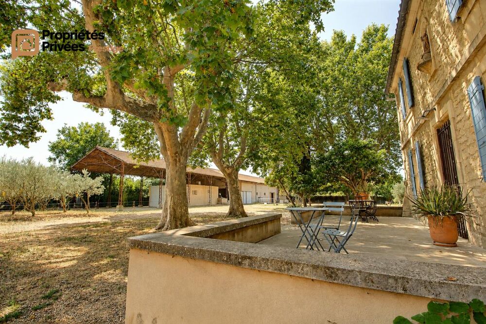 Vente Maison TARASCON  EN EXCLUSIVITÉ  Exceptionnel mas en pierre rénové de 364 m² habitables, offrant près de 1294 m² bâtis sur un terrain c Tarascon