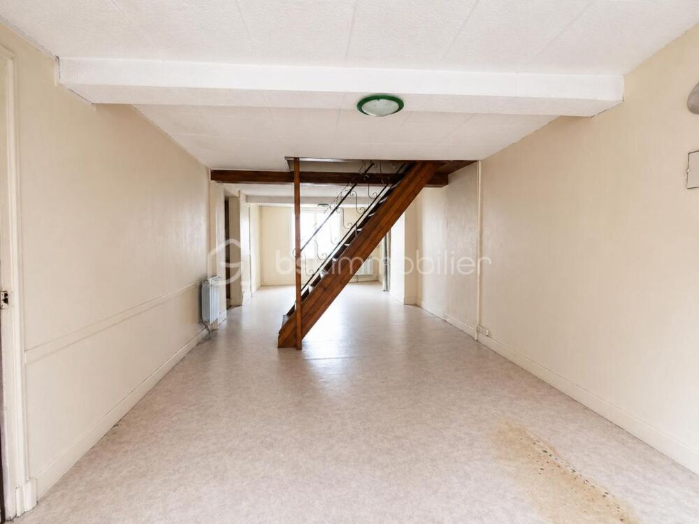 Maison de ville de 167 m² avec garage, 4 chambres et jardin  Un beau projet à façonner selon vos envies !