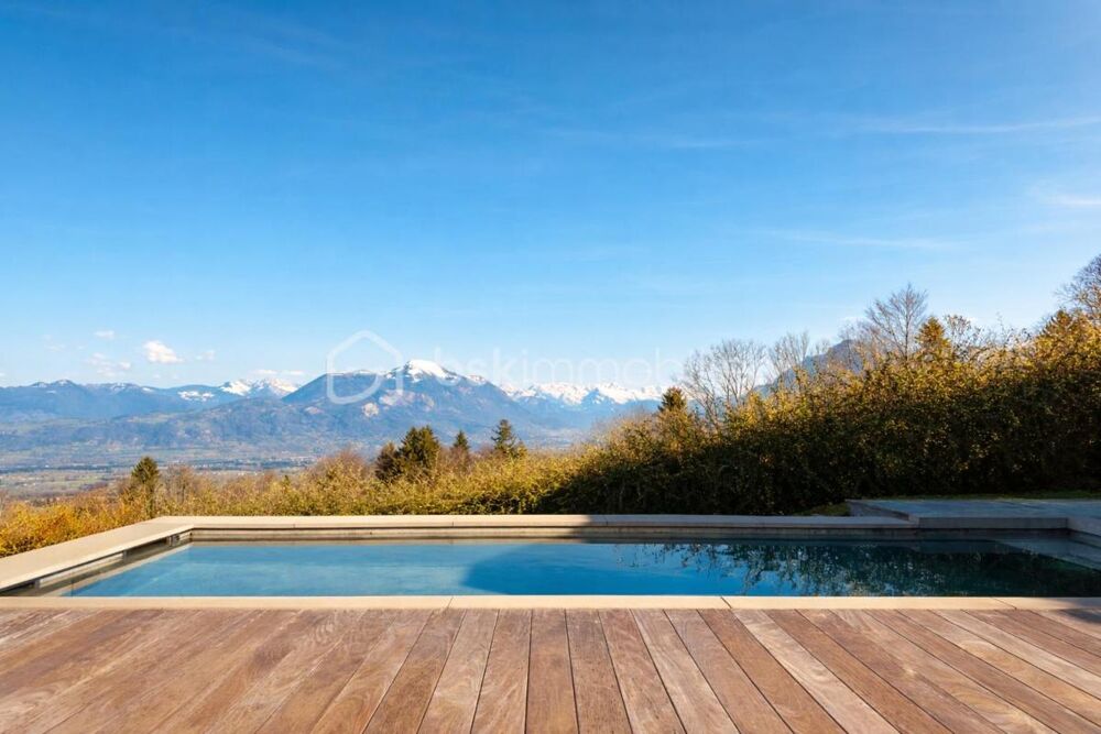 Propriété darchitecte Dunoyer  Panorama alpin exceptionnel, piscine & double habitation  Proche Annecy / Genève / Chamonix