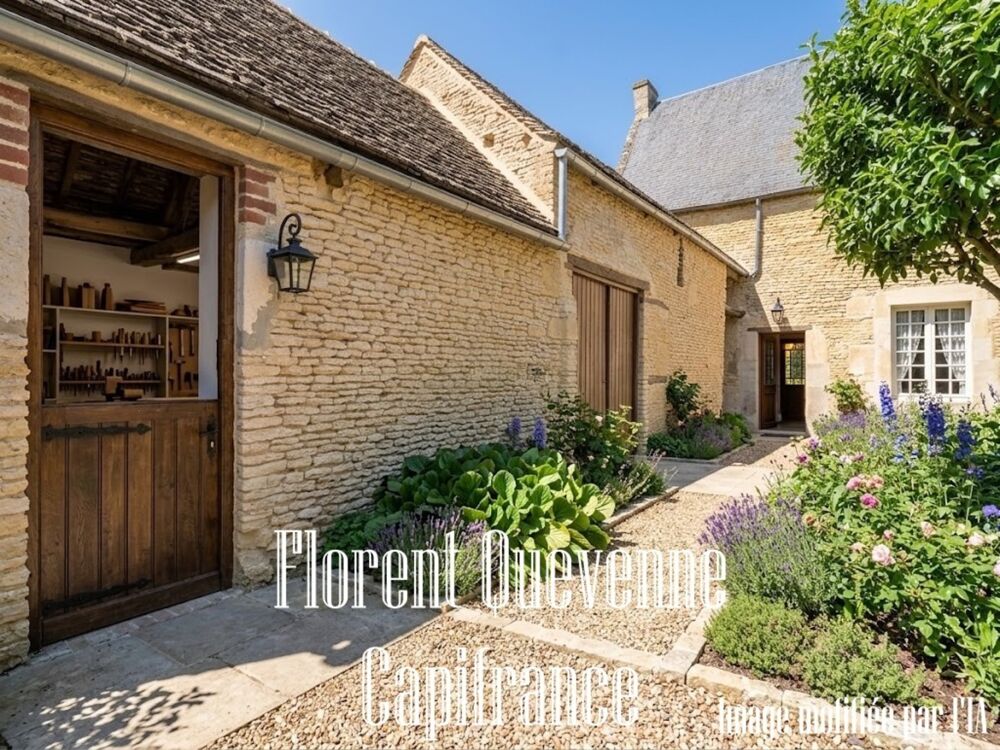 JORT  Maison de bourg en pierre avec dépendances et jardin
