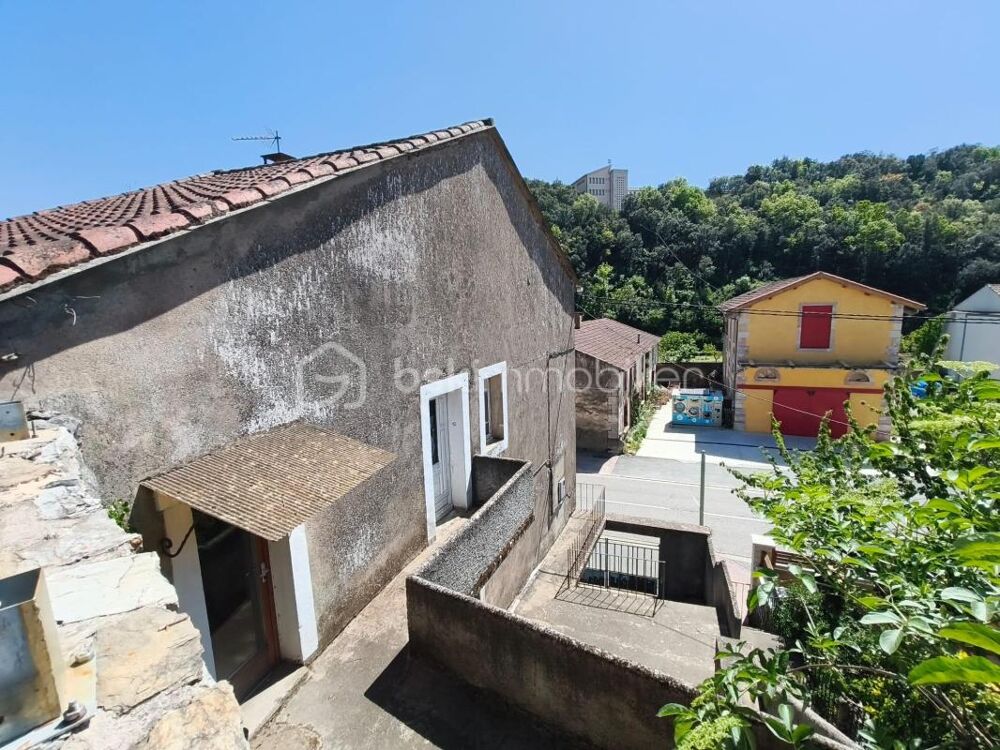 Maison à rénover avec extérieur