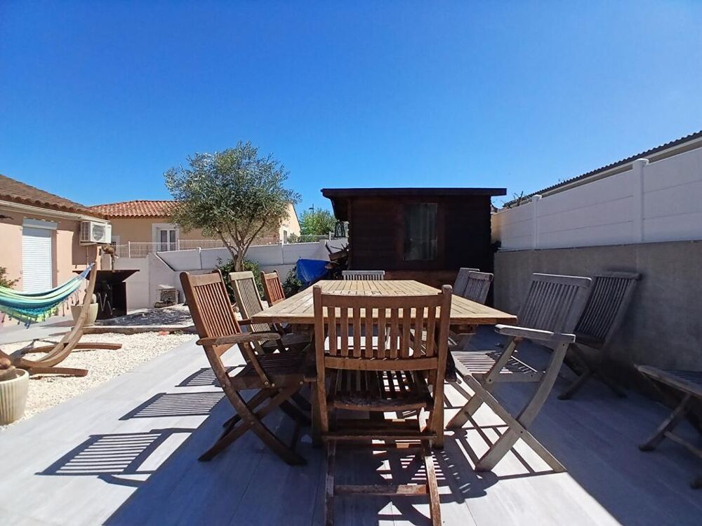Maison plain-pied 4 chambres avec terrasse et jardin