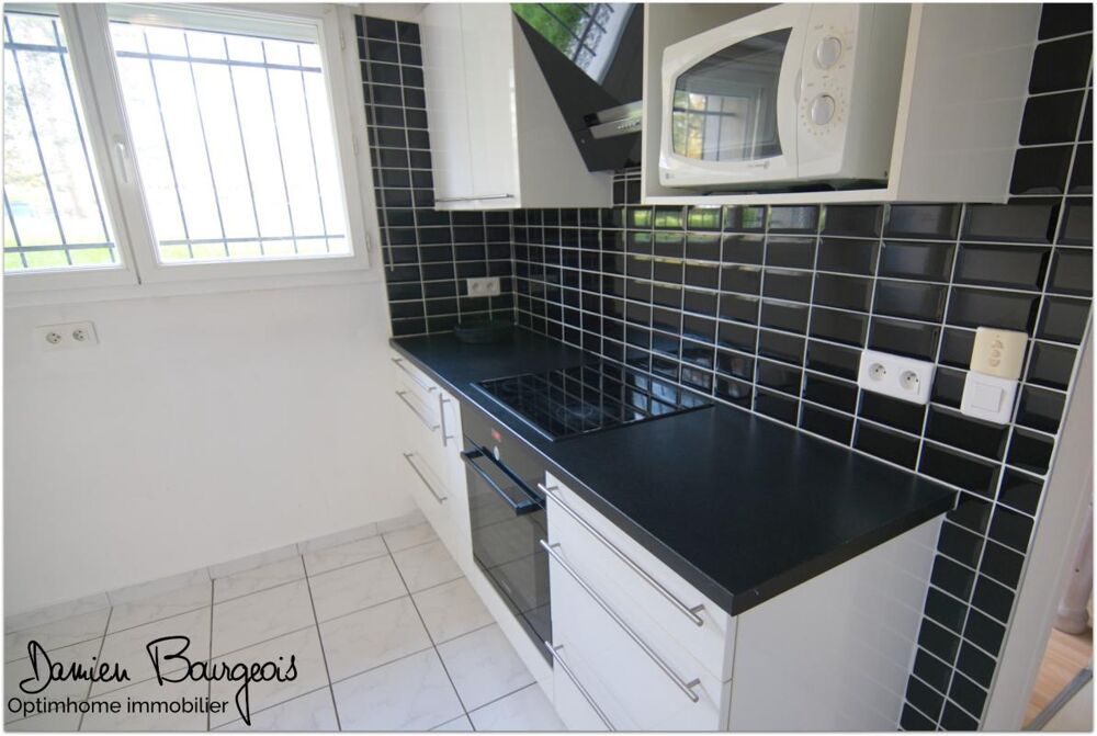 APPARTEMENT DE 79 m² EN REZ-DE-CHAUSSÉE AVEC PLACE DE PARKING INTÉRIEURE