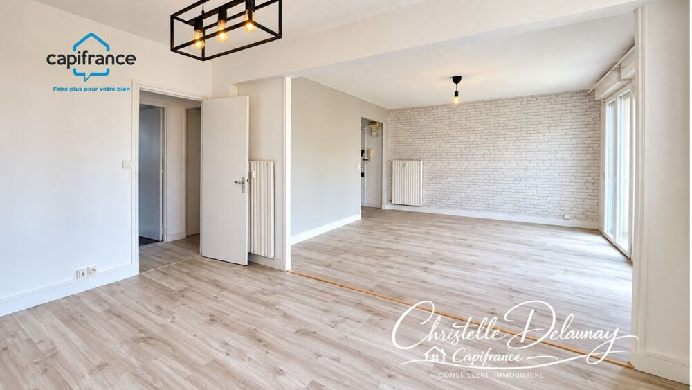 Vente Appartement À VENDRE – BEL APPARTEMENT DE 65 M² AVEC BALCON, PARKING ET CAVE À LAVAL Laval