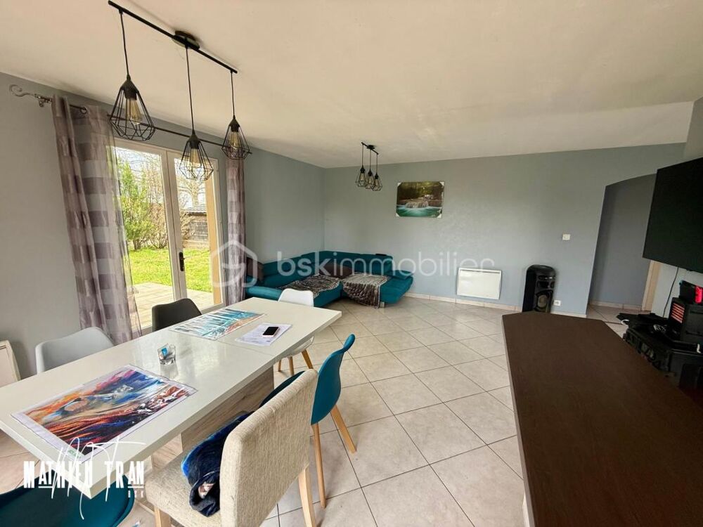 Chaleureuse maison à vendre dans un cadre enchanteur