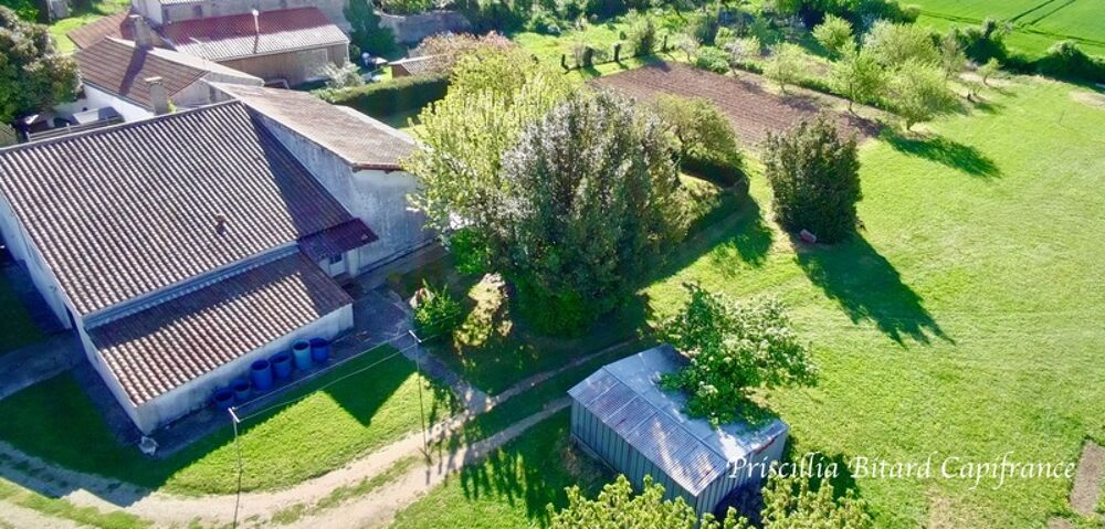 Maison avec beau potentiel d'évolution dans un environnement calme