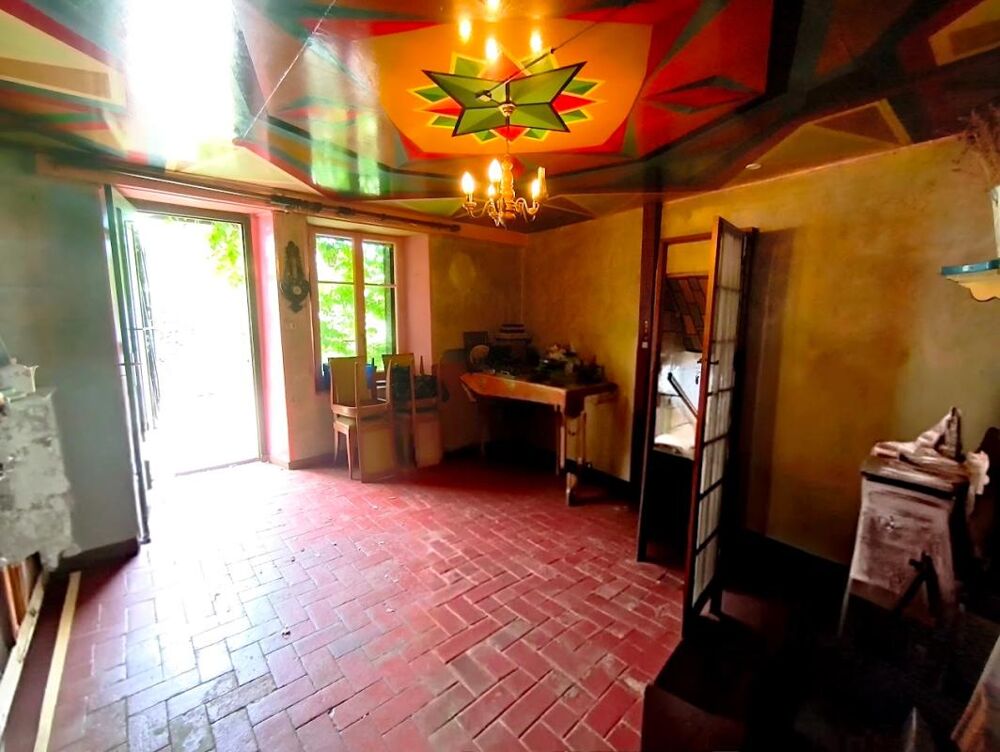 Maison de caractère avec jardin et fort potentiel d'aménagement