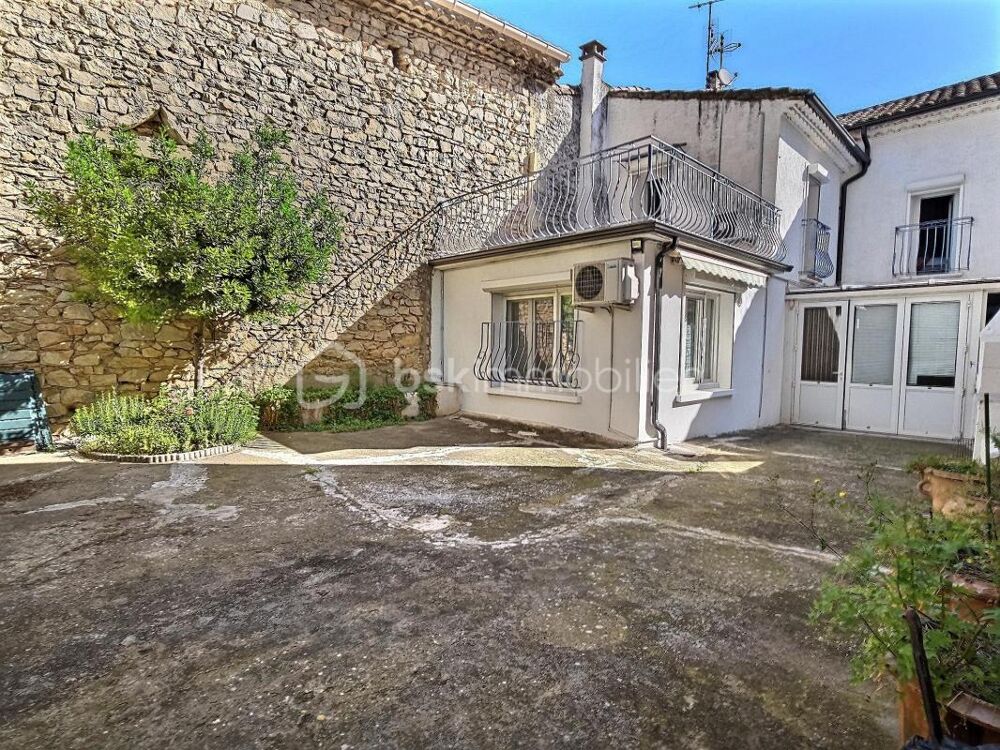 Maison familiale avec cour, grand garage et climatisation réversible  Un bien rare au coeur de Milhaud !