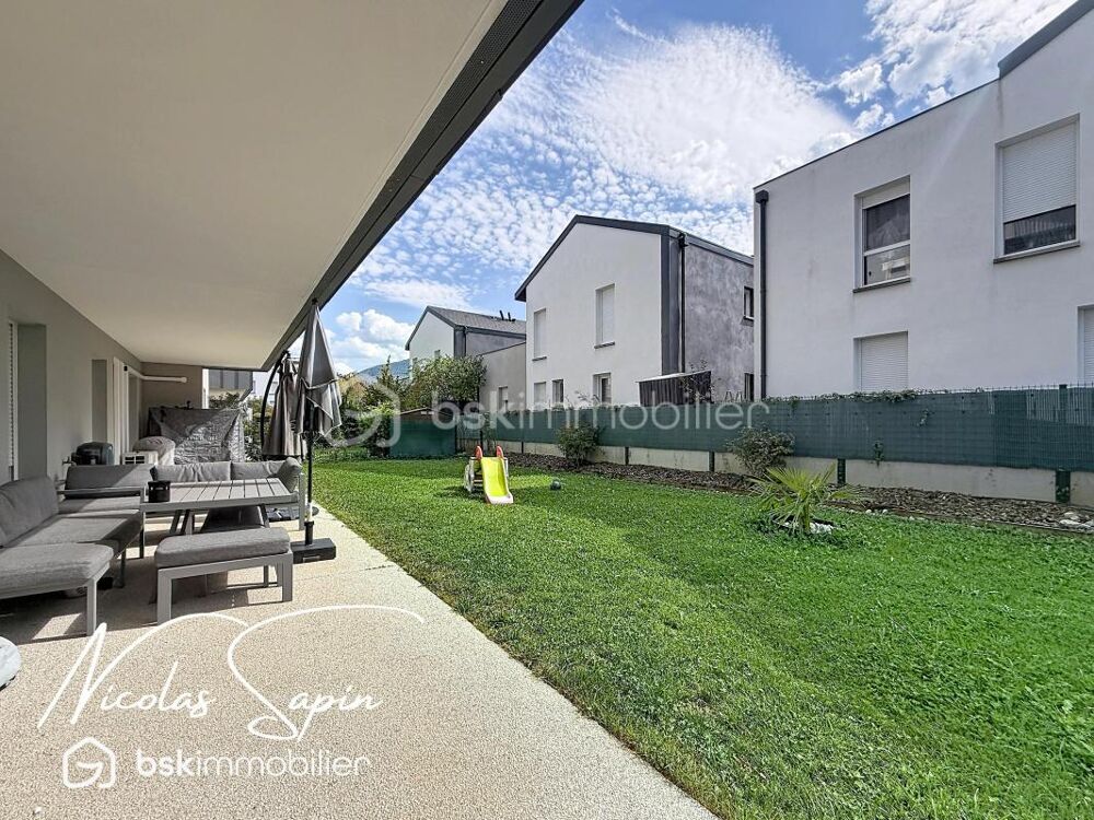 Appartement T4 en rez de jardin avec garage et place de parking privée