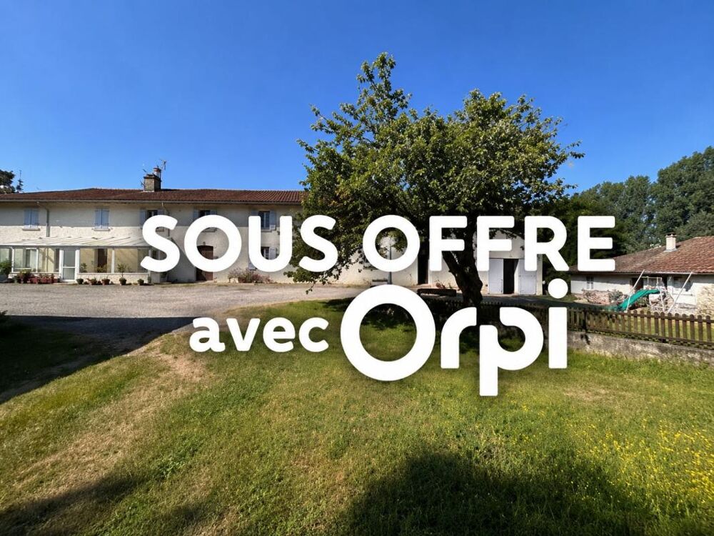 Tènement immobilier comprenant 3 batisses sur 2.5 hectares avec rivière