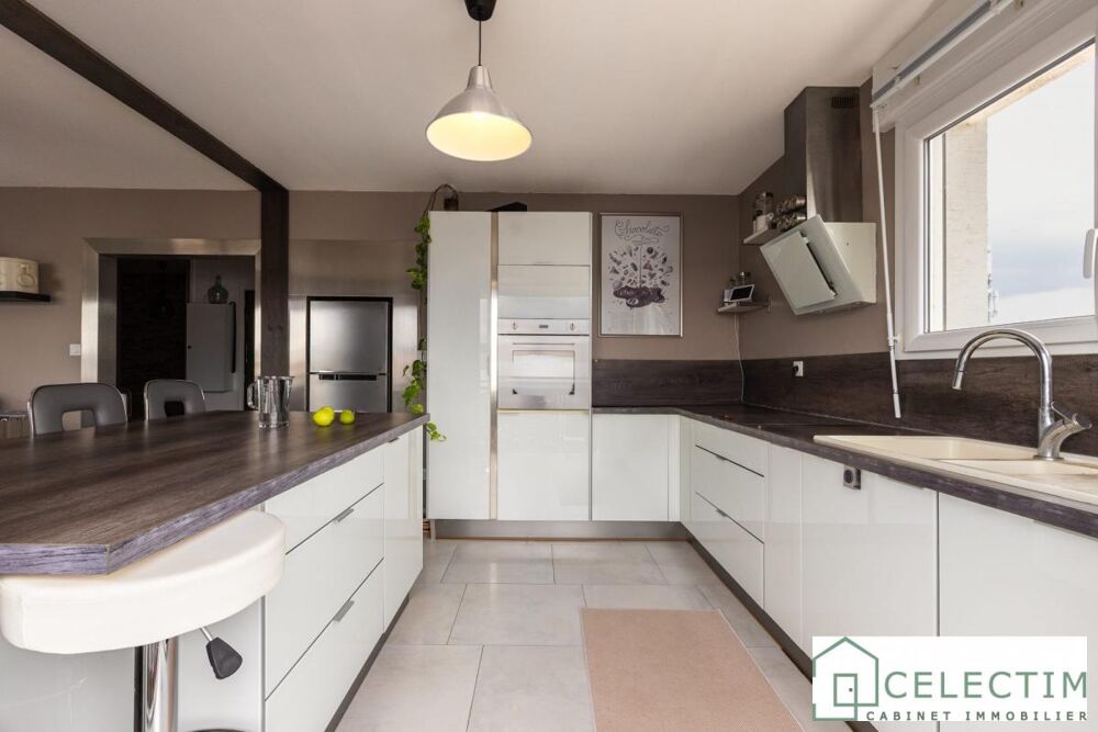 Appartement de 117 m² entièrement rénové - Double garage ?