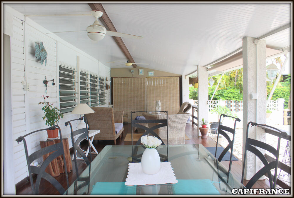 A VENDRE A KOUROU (97310) UNE MAGNIFIQUE MAISON EN BOIS T5 de 106 m² AVEC 2 MAISONS T2 INDEPENDANTES - TERRAIN DE 775 m² - AU PR