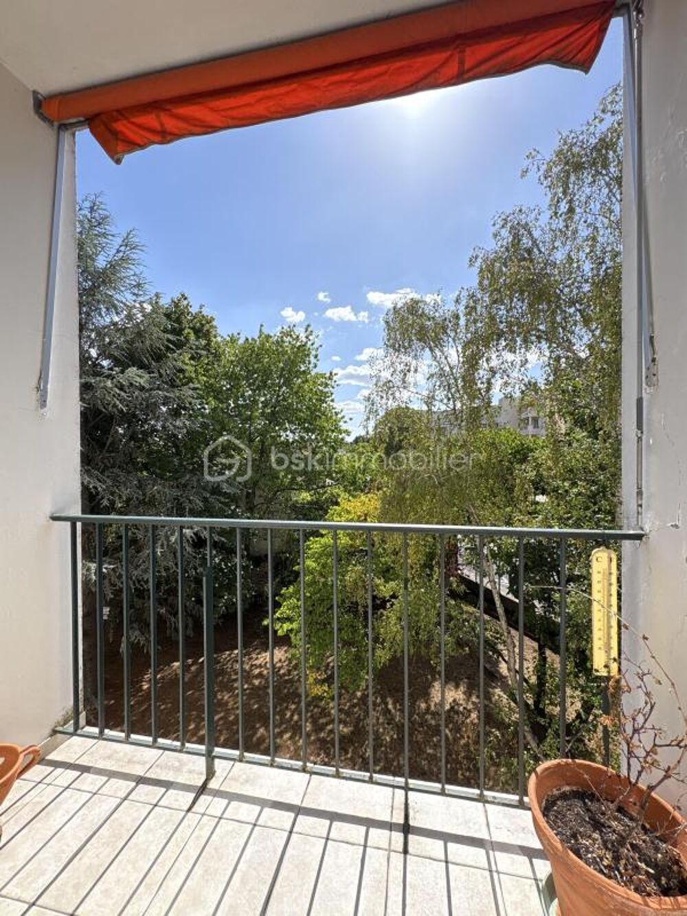 Appartement 70 m²  3 chambres  Balcon  Parking en box  Cave  Résidence sécurisée