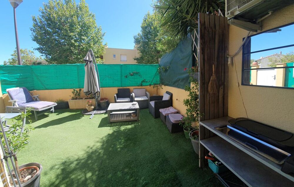 Appartement Cogolin 3 pièce(s) 56.74 m2 Coup de Coeur dans quartier résidentiel sécuriser avec place de parking situé en rez de