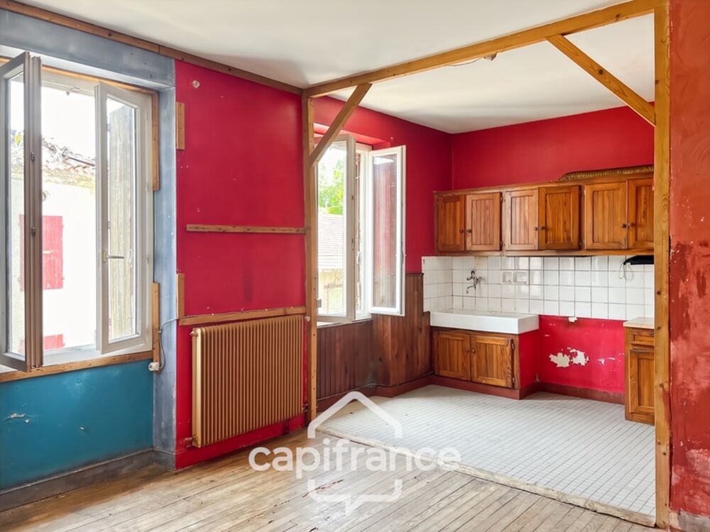 Maison à renover avec fort potentiel, cour et garage