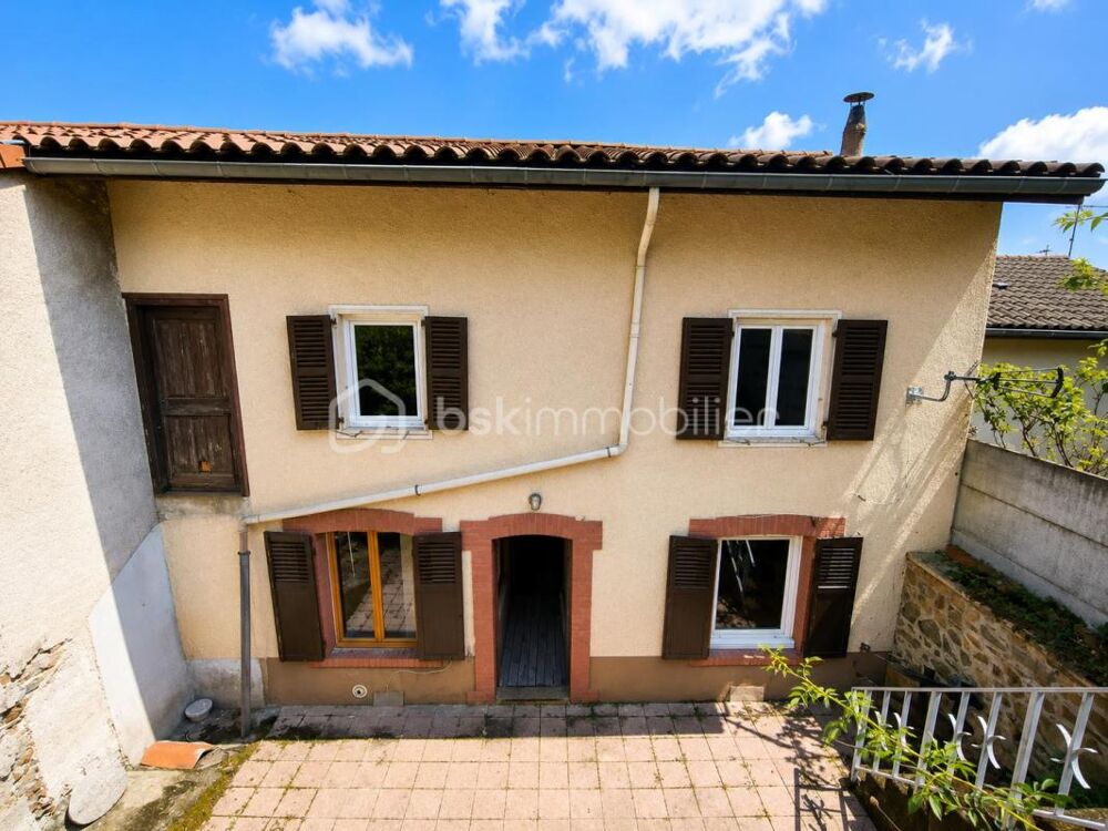 Maison de ville de 167 m² avec garage, 4 chambres et jardin  Un beau projet à façonner selon vos envies !