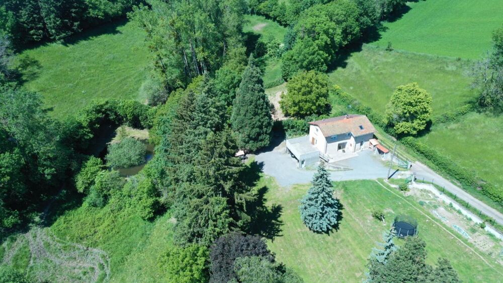 Maison en pleine nature sur un terrain arboré de 3551 m²