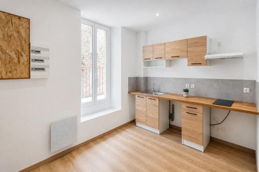 Immeuble avec local commercial et logement T3 à Vals-les-Bains