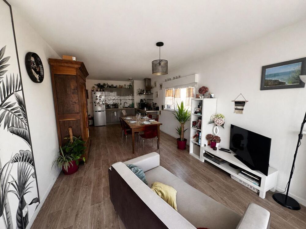 THEIX-NOYALO - Appartement T3 de 65 m² avec jardin privatif, terrasse, garage et cave