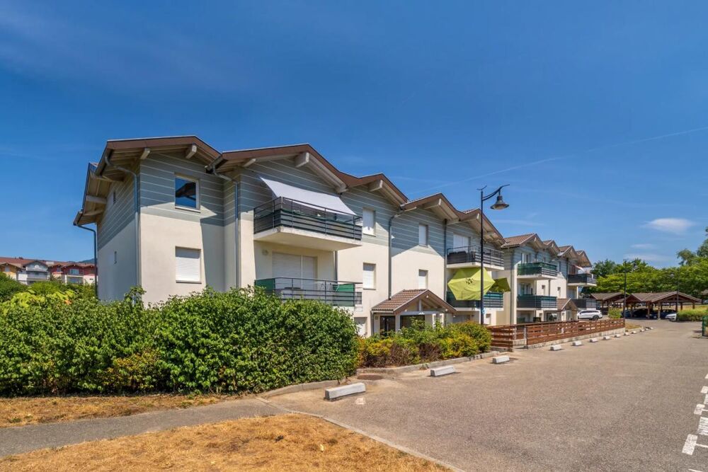 Appartement T3 de 58,27 m² avec balcon, carport et stationnement