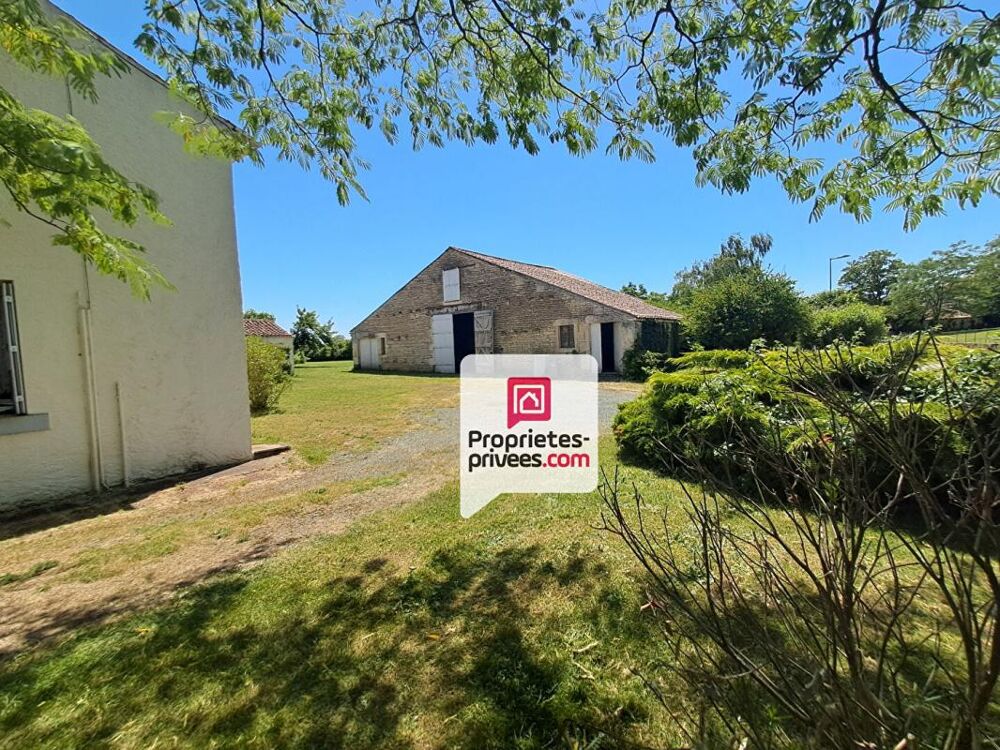 Ensemble immobilier maison d habitation et grange de caractère sur terrain constructible de 2 800 m²