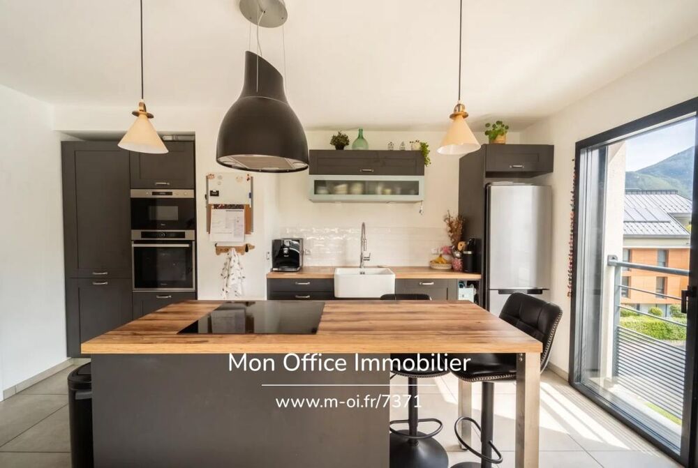 Vente Appartement Référence : 7371-TCA - Appartement 4 pièces de 85m2 avec terrasse vue montagne et garage double rue Louis Boch (Annecy centre-vi Annecy