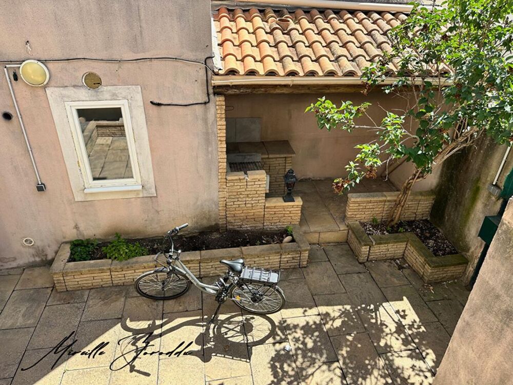 Vente Maison REDESSAN  A VENDRE ENSEMBLE IMMOBILIER  de 185m² avec cour, terrasse et garage Redessan