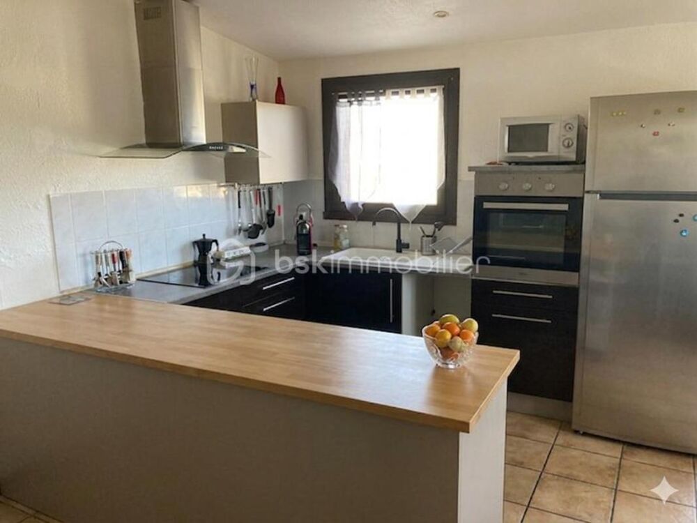 Appartement T3 avec parking et jardin