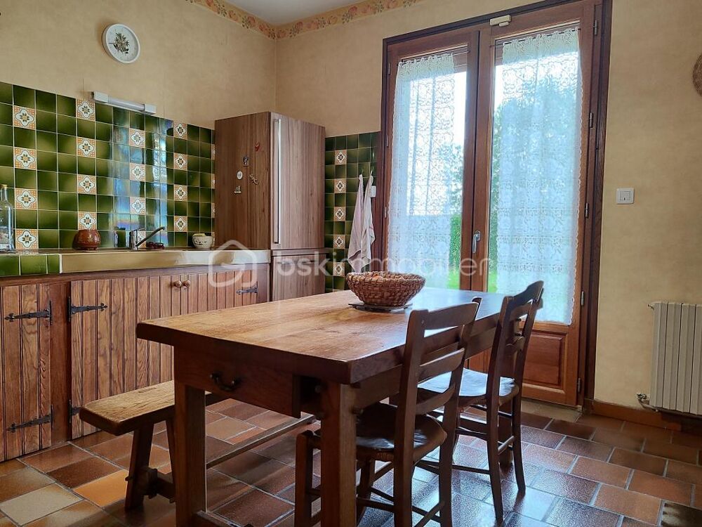 Maison individuelle avec terrain, garage et quatre chambres