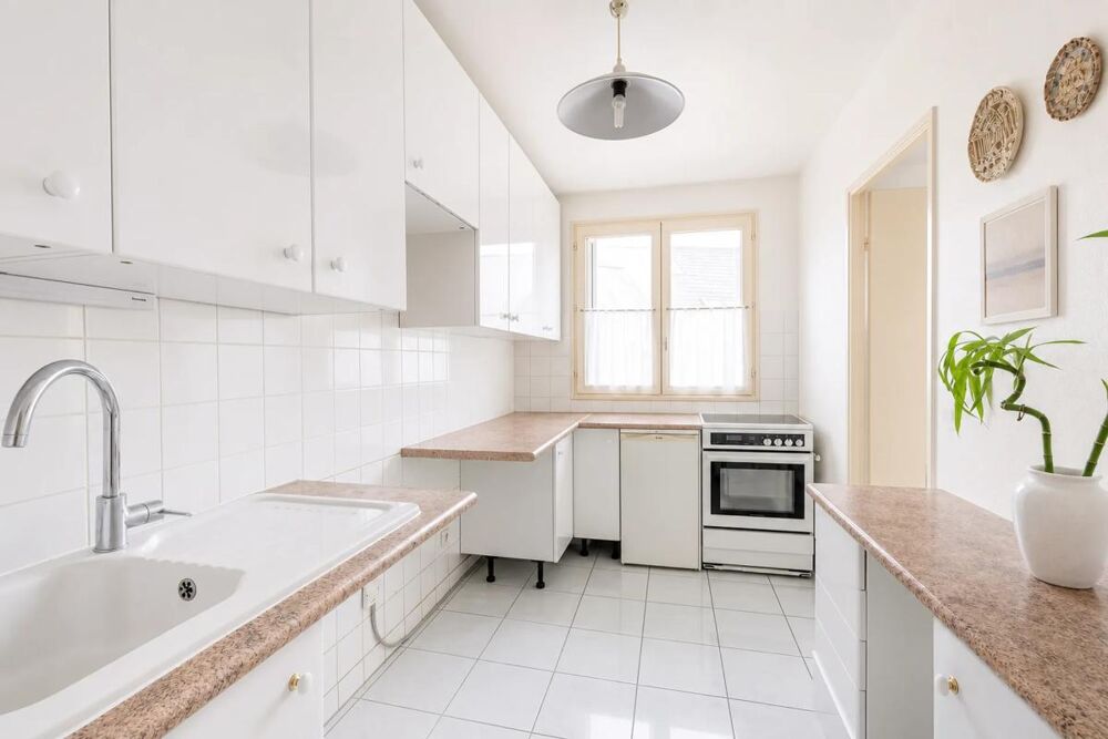 Duplex 4 pièces de 101 m² avec balcon et double garage (box)