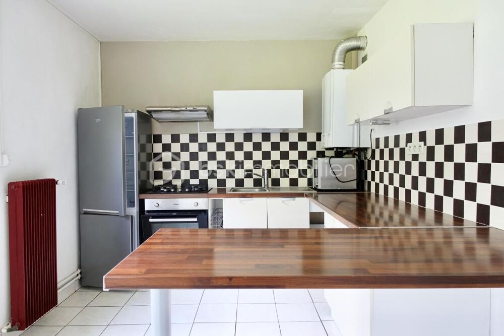 T3 bis parfait état - balcon + cave + stationnements sécurisés - idéal RP ou investissement