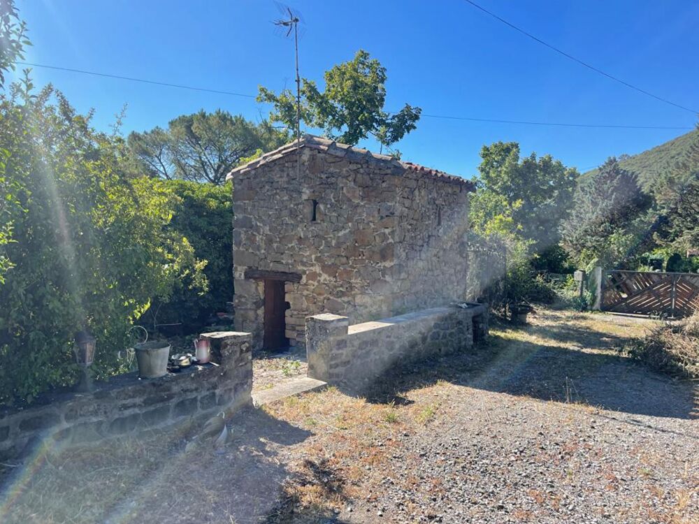 Mas en pierres mitoyen proche Anduze sur terrain constructible de 3300 m2