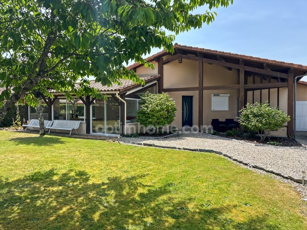 Villa de plain-pied avec véranda en excellent état et à proximité des commerces, jardin, garage
