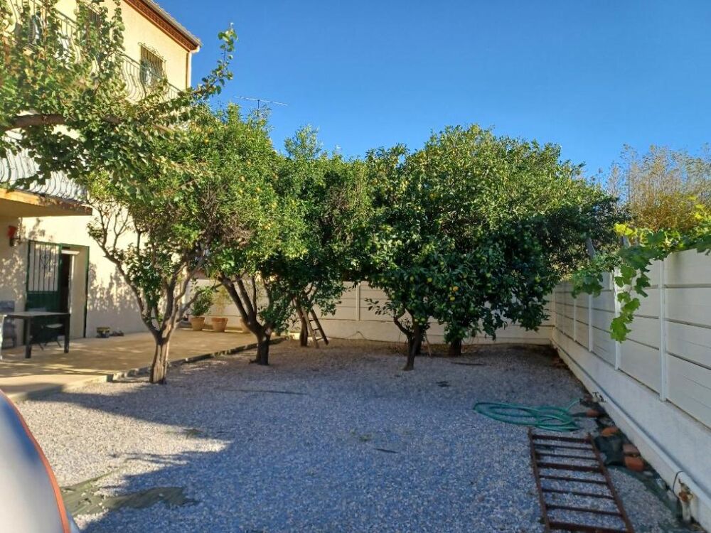 Magnifique appartement de type T2 en rez-de-chaussée avec jardin de 170 m² sans vis-à-vis et véranda de 20 m²