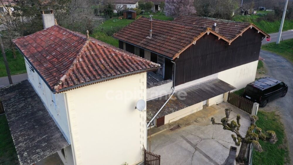 Maison - surface habitable 107m2 - 3 chambres - garage - dépendance à GRIGNOLS (33)