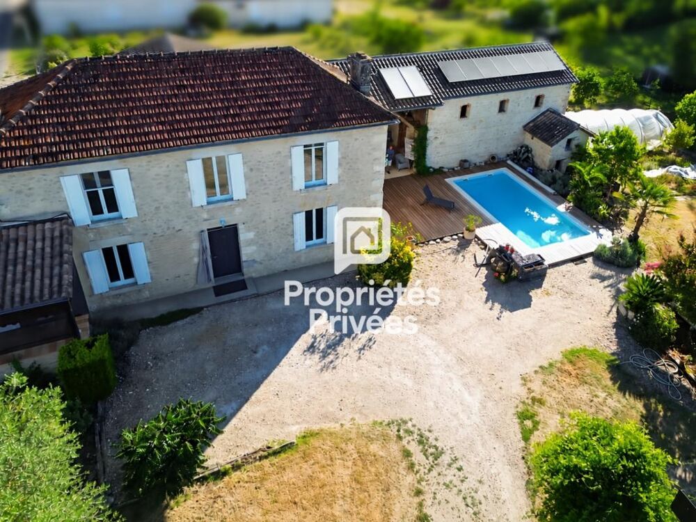 Maison en pierre de 185 m² avec piscine, dépendance et parc arboré à 10 min de Marmande