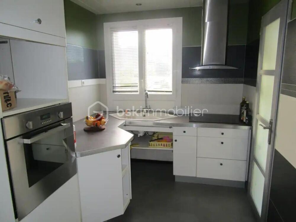 T4 avec 3 chambres balcon place de parking et cave