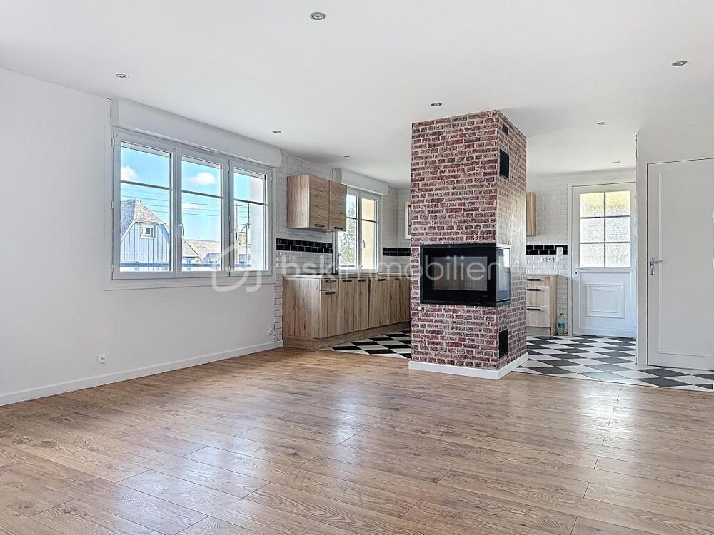 Maison sur sous sol aménagé bénéficiant d'un grand garage attenant