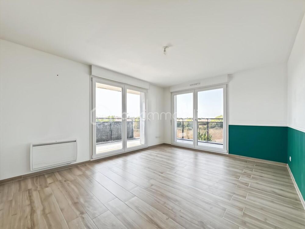 Appartement 3 chambres avec balcon et 3 places de parking