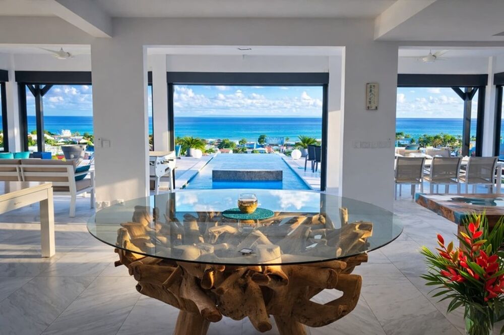 A VENDRE - PROPRIÉTÉ CONFIDENTIELLE  VILLA CONTEMPORAINE  VUE MER ABSOLUE  PRESTATIONS SIGNATURE - SAINT FRANCOIS