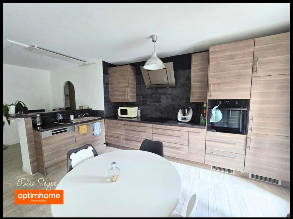 Vente Appartement T3 Cessy centre en rez-de-jardin avec terrasse de 57 m², garage, cave et parking Cessy