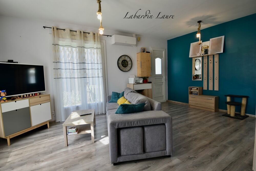 Maison de plain pied - 2 chambres - 1 abri de jardin - terrain clos avec places de parking