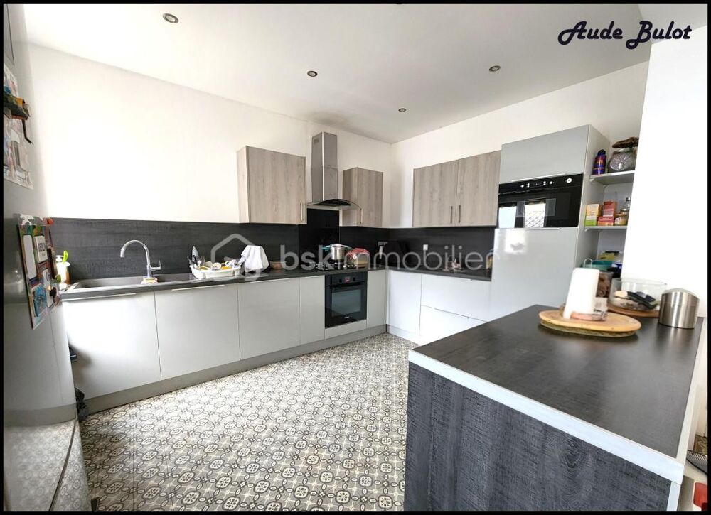 Maison de ville 10 pièces  332 m² utiles