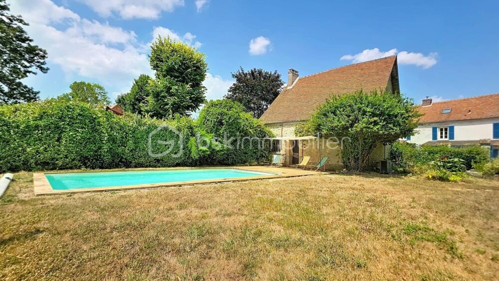 Maison de caractère 210 m² habitables (226 m² au sol) avec piscine chauffée, dépendances et jardin arboré