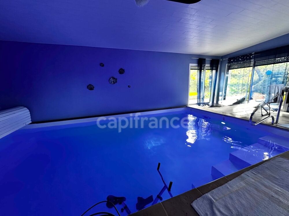 Maison spacieuse avec jardin fleuri et piscine intérieure LANDEDA (29)