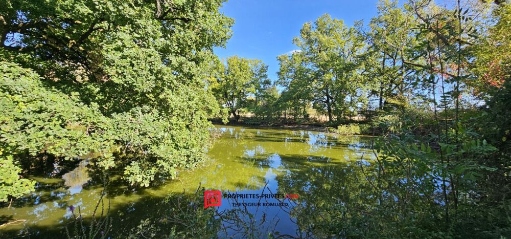 Magnifique longère de 315 M² avec piscine couverte, tennis et étang sur 1,4 hectare